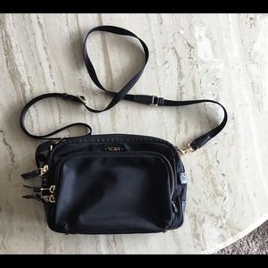 TUMI Troy black and gold crossbody